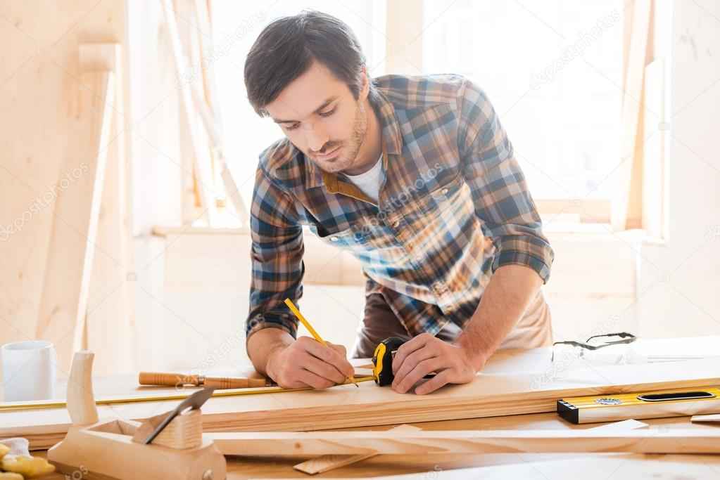 depositphotos_72057867-stock-photo-carpenter-working-with-wood-in_11zon